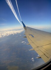 aero plane sky view | sky background with clouds | above the clouds | sunset | white cloud on sky |sunrise
 - obrazy, fototapety, plakaty