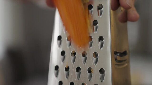 close up grating carrots