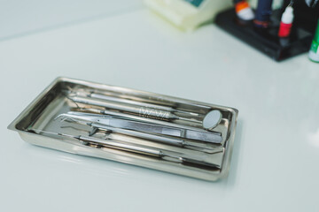 Sterile metal instruments for dental treatment. Tools for the dental office