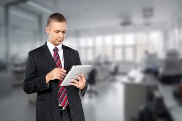 Carefree male employee in modern office