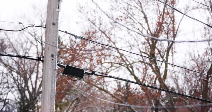 Neighborhood power lines in spring snow storm 