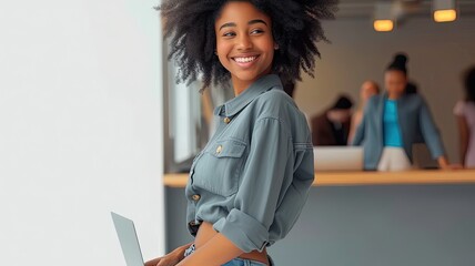 Young afro woman with afro style hair, called Sara, smiling in a co-working office, with her laptop and with another people in the background - obrazy, fototapety, plakaty