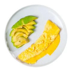  Omelette served for breakfast with sliced avocado on platter. Isolated over white background © JackF