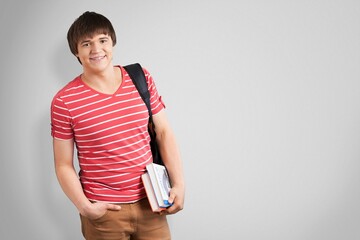 Portrait of a young happy student with backpack