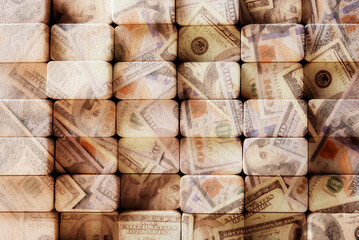 Abstract background made of wooden blocks with USD currency mosaic