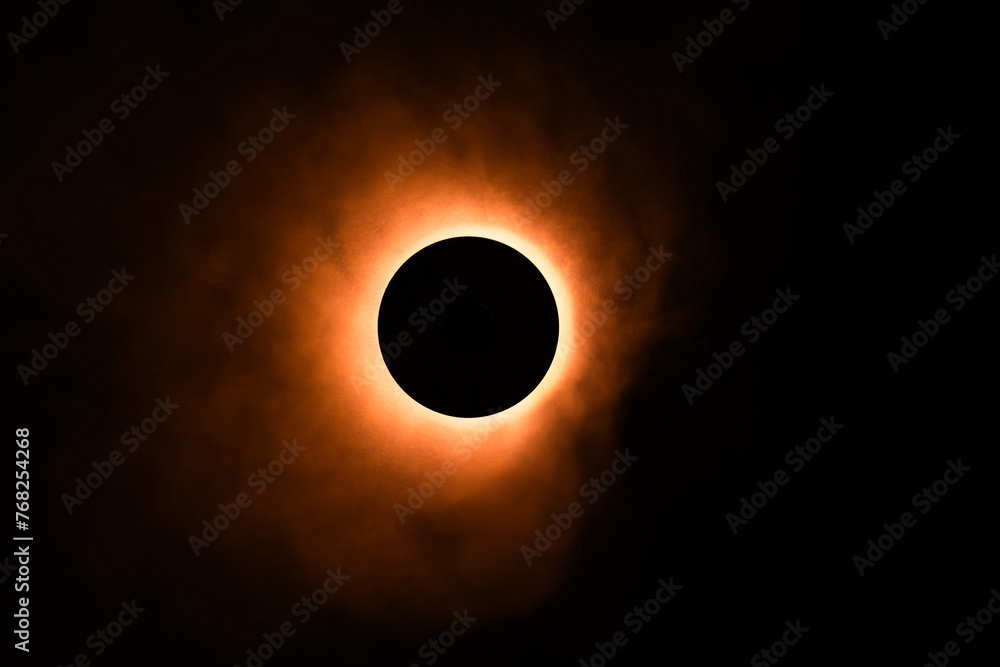 Wall mural eclipse re construction in a studio using a bright flashlight and a round cap with a bit of atmosphe