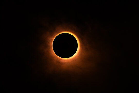 Eclipse re construction in a studio using a bright flashlight and a round cap with a bit of atmospheric spray