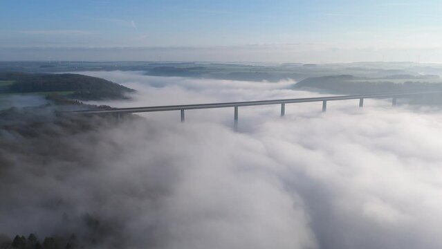 Drone of the highest motorway bridge in Germany over the valley of the river Kocher above the fog