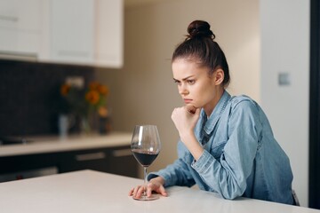 Lonely Woman in Distress, Depressed and Addicted to Alcohol, Seeking Solace at Home