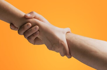 Holding hands support, care for teamwork