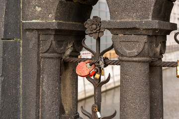 Lovers' locks locked on a bridge. Padlocks of lovers close-up