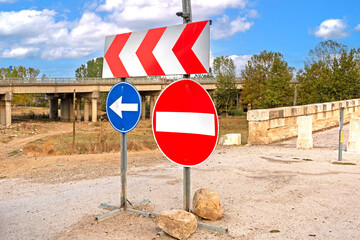 Traffic signs on the road showing directions for different places outdoors - 768269488