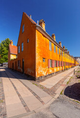 District Nyboder with yellow historic row houses in Copenhagen, Denmark