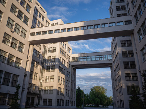 evening blue sky and architecture of Derzhprom that a tall building built in soviet union era