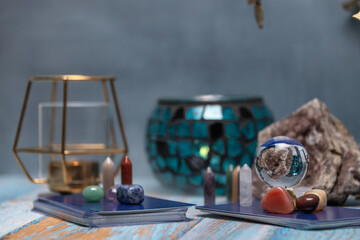 Fortune Telling Table with a crystal ball and tarot cards.