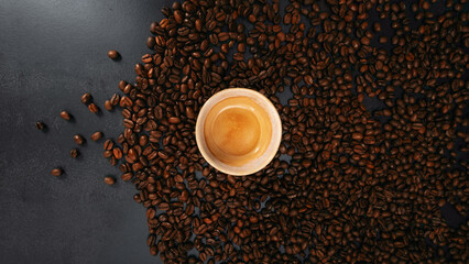 coffe expresso with coffee beans and clean background.