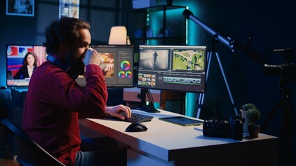 Video editor polishing raw footage, applying modern editing techniques in order to enhance clarity,...