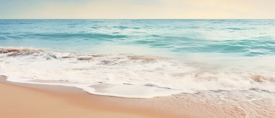 Soft wave of the sea on the sandy beach. Seascape background