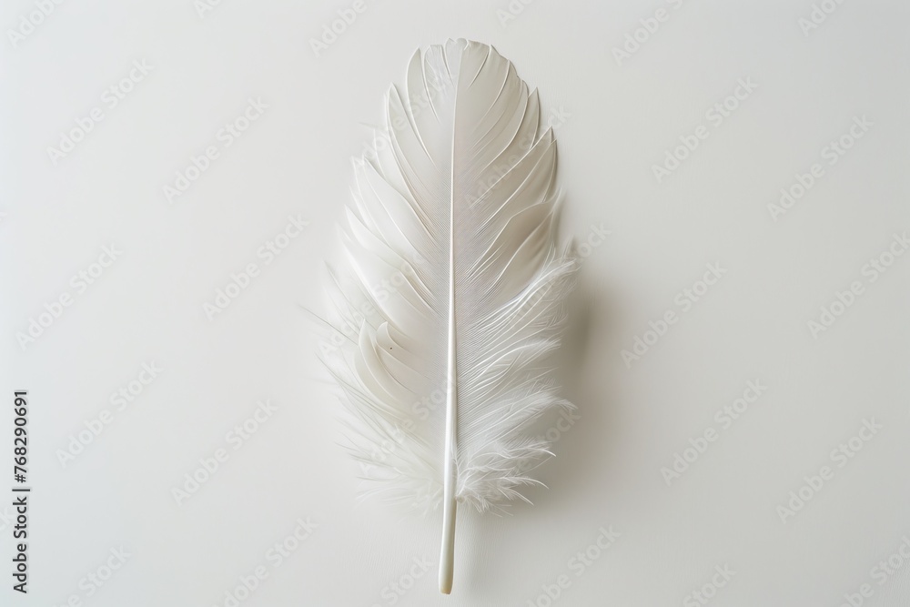 Aufkleber a flawless and soft white feather is centered and isolated on a clean white background, symbolizing 