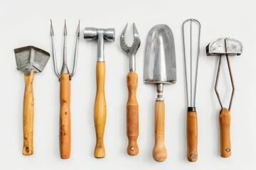 A neatly arranged collection of vintage gardening tools against a white background, displaying a variety of shapes designed for different gardening tasks