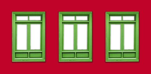 Row of windows. Spanish architecture background. Three windows frame isolated red facade. Retro style window. Green wood frame. Building facade. Empty copy space. Italian style balcony window.
