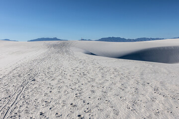 Hiking the Alkali Flats Trail at White Sands National Park.