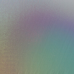 An abstract iridescent grainy grunge texture background image.