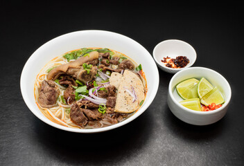 Bún bò Huế. Spicy Beef and Pork Noodle Soup