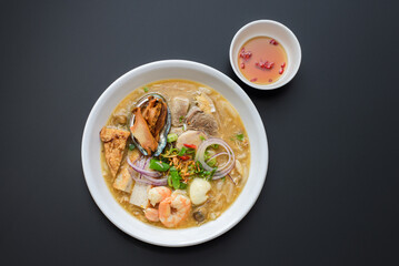 Banh Canh. Sticky Thick Vietnamese soup with shrimp, port, egg, and abalone.