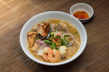 Banh Canh. Sticky Thick Vietnamese soup with shrimp, port, egg, and abalone.