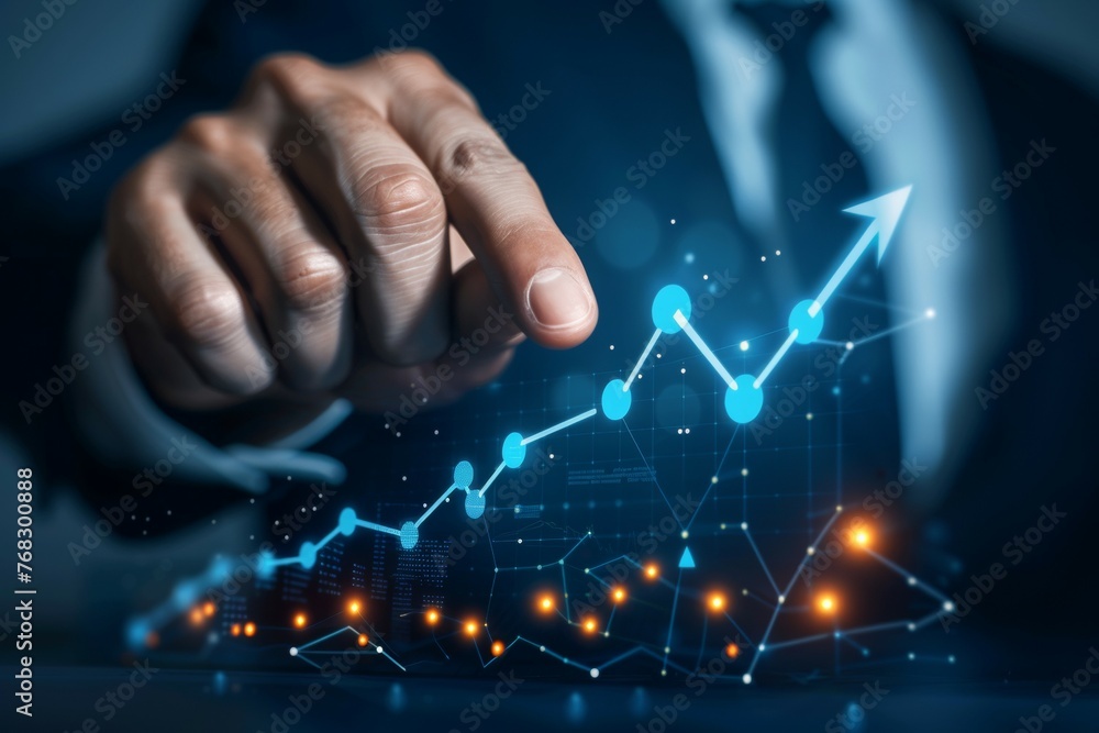Poster a man is pointing at a graph with a line that is going up