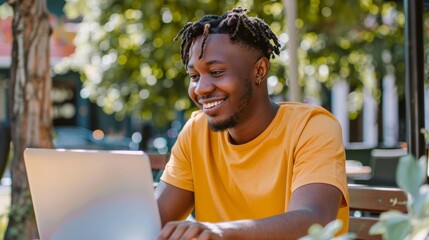  Cheerful Young Man Using Laptop Outdoors