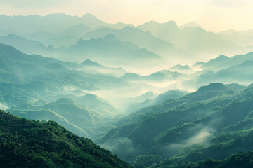 a panoramic view of a mountain range covered in mist at sunrise, evoking the vastness and beauty of nature
