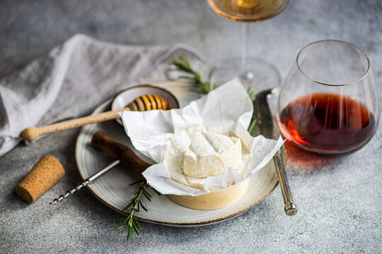 Elegant brie cheese and wine pairing on a table