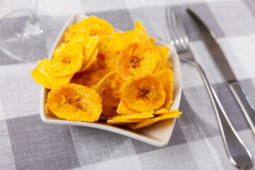 Fried slices of ripe plantains, a traditional and popular snack and accompaniment in Central America
