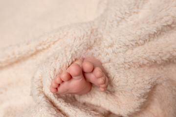 the legs of the newborn baby. the legs of the newborn flaky skin. peel off the skin. peeling skin newborn. newborn child. feet