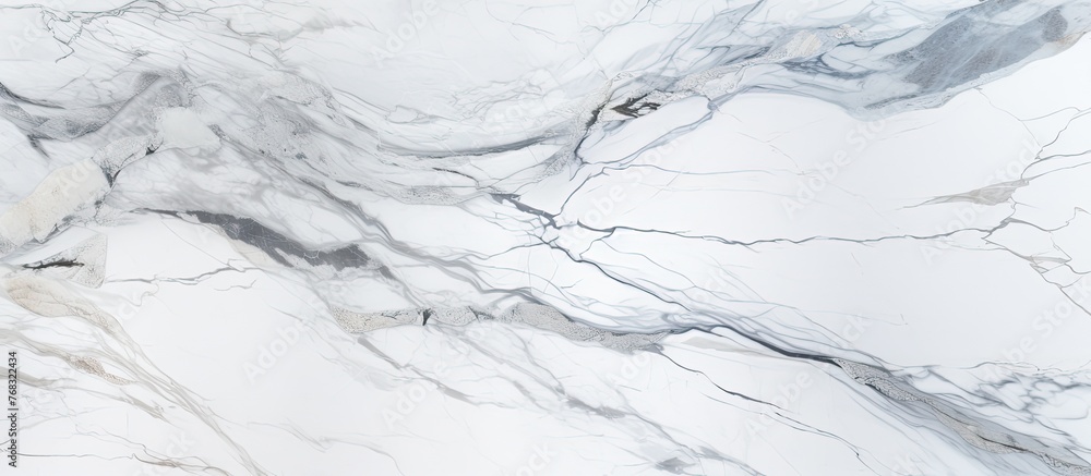 Poster a closeup of grey marble texture resembling snow covering a slope. the intricate lines and patterns 