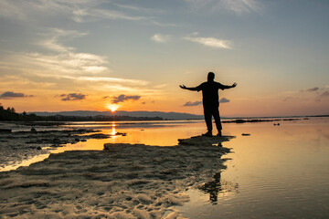 Silhouette of a young man