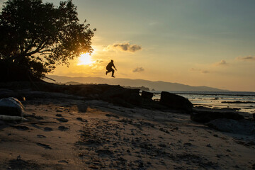 Silhouette of a young man