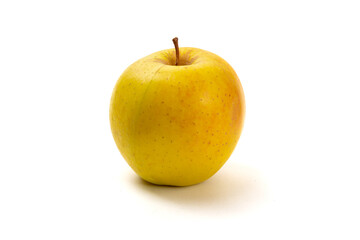 A single ripe yellow Golden Delicious apple isolated on white