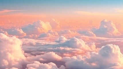 Beautiful aerial view above clouds at sunset. Flying above clouds - obrazy, fototapety, plakaty