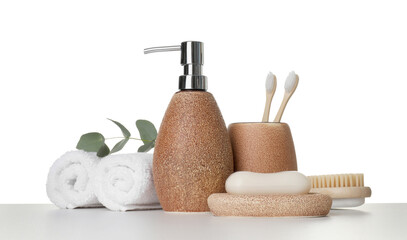 Bath accessories. Different personal care products and eucalyptus branch on table against white background