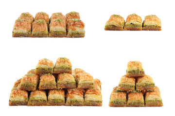 Eastern sweets. Pieces of delicious fresh baklava with chopped nuts isolated on white, set