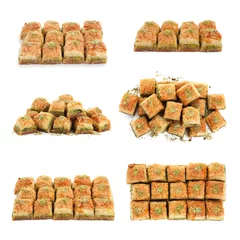 Keuken spatwand met foto Eastern sweets. Pieces of delicious fresh baklava with chopped nuts isolated on white, set © New Africa