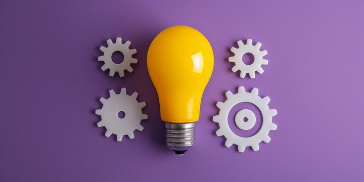 Yellow light bulb and gears on purple background, concept of ideas and creativity