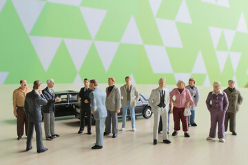 a small figures of business man meeting