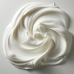 Texture of high quality cosmetic moisturizing thick white skin care cream on muted white background