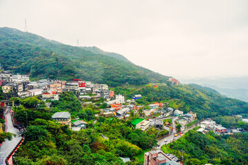 Fototapeta na wymiar Jiufen, New Taipei, Taiwan, Republic of China, 01 22 2024: The landscape of Jiufen old street and pacific ocean 