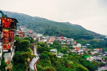 Fototapeta premium Jiufen, New Taipei, Taiwan, Republic of China, 01 22 2024: The landscape of Jiufen old street and pacific ocean 