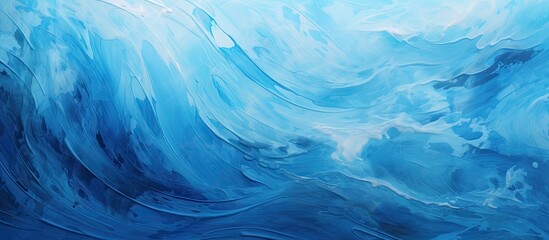 A closeup of a swirling pattern of electric blue and white paint resembling a wind wave in the ocean, creating a fluid landscape painting